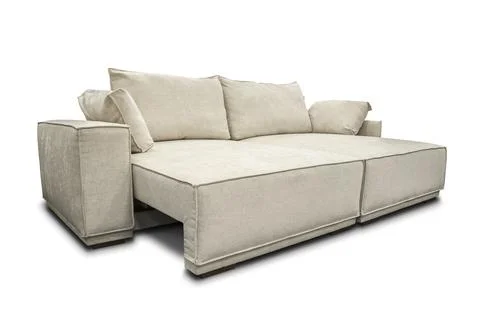Beige large sofa on white background Fotos Stock