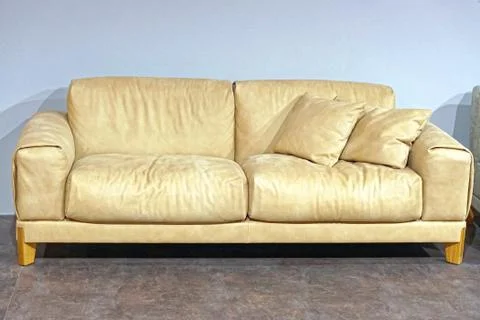 Beige leather sofa Stock Photos