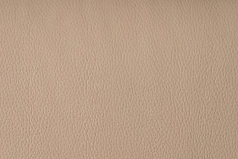 Beige leather texture background. Blank space. Colorful texture. Stock Photos