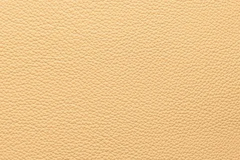 Beige leather texture background with fine pebble grain pattern Stock Photos