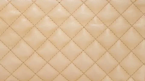 Beige leather upholstery pattern Stock Photos