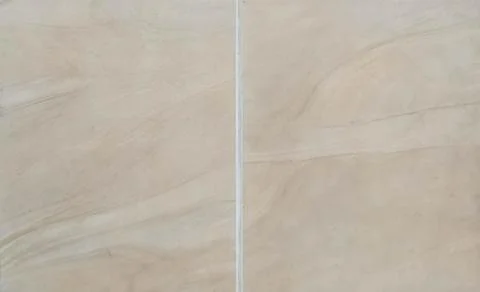 Beige marble tile texture with natural wavy pattern, cream ceramic floor bac 写真素材