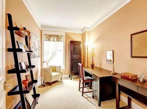 Beige office interior with desk Stock Photos