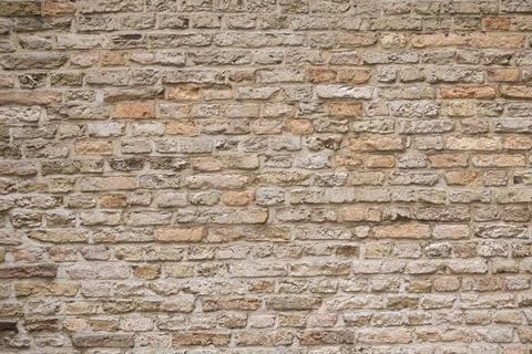 Beige old brick wall background grunge texture Stock Photos