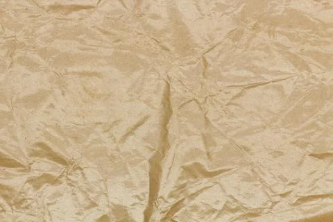 Beige paper texture. Abstract background. Smooth brown wrapping kraft paper Stock Photos