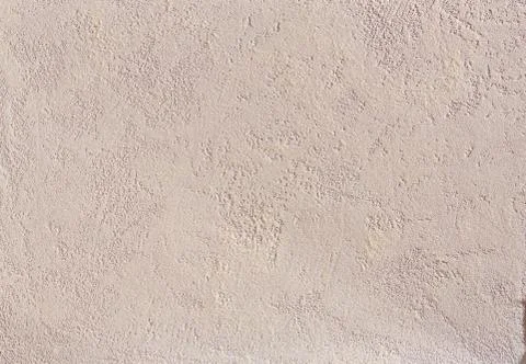 Beige plaster textured background. Abstact beige stucco. Texture of plaster on Stock Photos