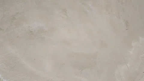Beige plaster wall texture background with copy space Stock Photos