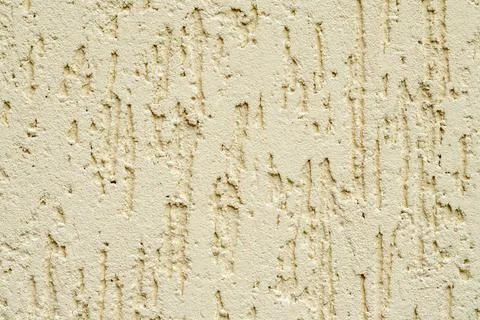 Beige plastered wall texture. Seamless surface and abstract solid background 写真素材