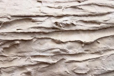 Beige plastering surface background. Art stucco wall texture. Stock Photos