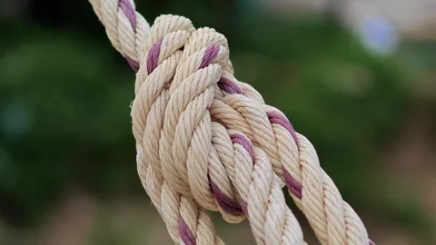 Beige rope string with knot Stock Footage 304593381
