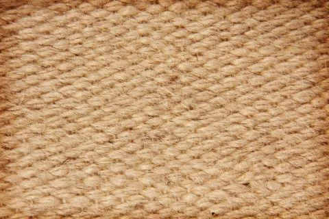 Beige rough camel wool fabric texture taken closeup.background. Stock Photos