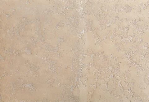 Beige rough wall textured background. Abstact stucco. Texture of plaster on the Stock Photos