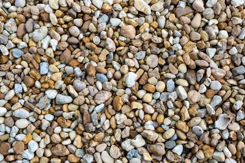 Beige Rounded Pebbles Stone Surface Overhead Texture Background Stock Photos