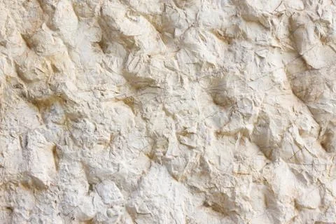 Beige smooth stone wall texture Stock Photos