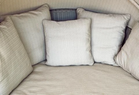 Beige sofa with cushions Stock-Fotos