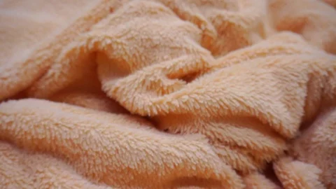 Beige soft fabric texture. The fabric moves slowly. Stock Footage 112625139