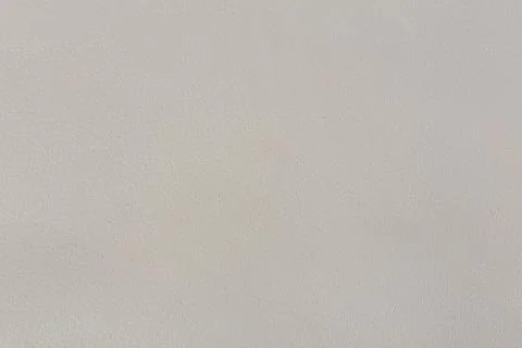 Beige soft leather texture on macro. Leather texture close-up. Stock Photos