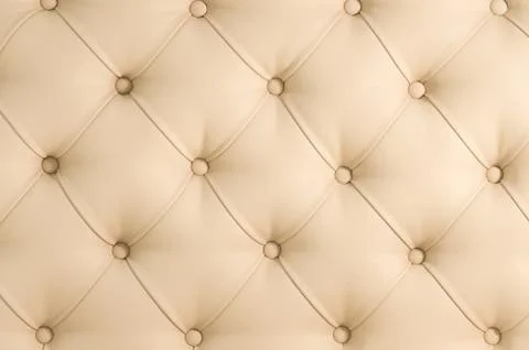 Beige soft tapestry pattern background with symmetrical buttons on the corners Stock Photos