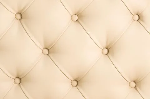 Beige soft tapestry pattern background with symmetrical buttons on the corners Stock Photos