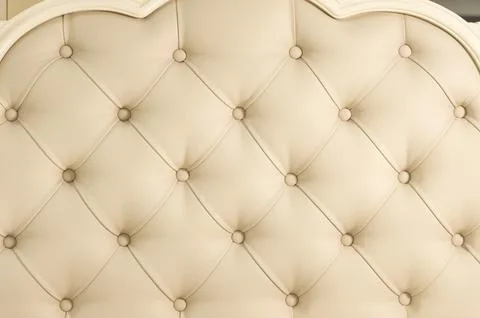 Beige soft tapestry pattern background with symmetrical buttons on the corners Stock Photos