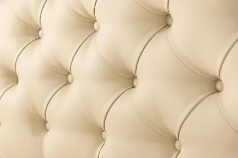 Beige soft tapestry pattern background with symmetrical buttons on the corners Stock Photos