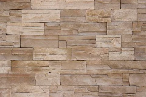 Beige stone wall Фото