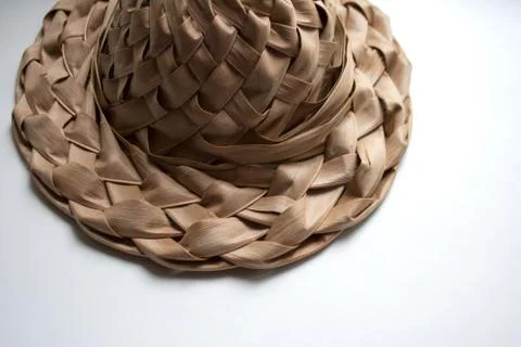 Beige straw hat on white background Stock Photos