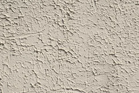 Beige Stucco Wall Texture with Rough Plaster Surface and Grunge Pattern Detail Stock Photos