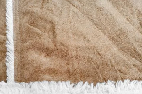 Beige suede texture with artificial soft fur. closeup shammy background Stock Photos
