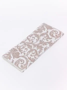 Beige swirl pattern fabric folded Stock Photos