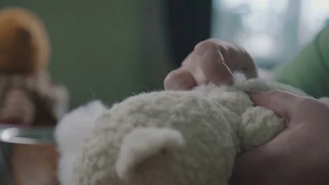Beige teddy bear: the process of creation and stuffing a soft toy Stock Footage