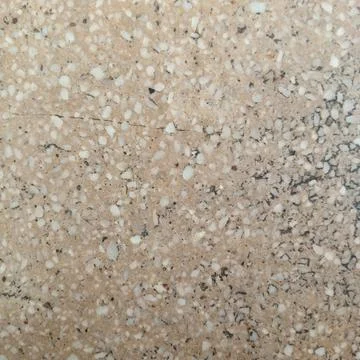 Beige terrazzo tile flooring texture small stone rock aggregates Fotos de archivo