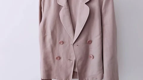 Beige Textile Suit on White Background- Chic Understated Video stock 312092189