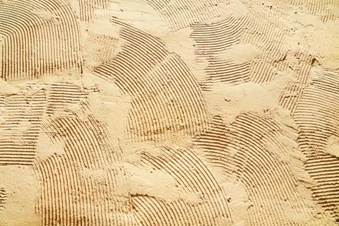 Beige texture of decorative plaster for background Stock Photos