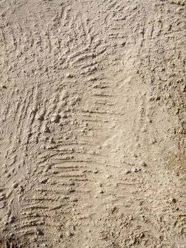 Beige textured wall with plaster applied with putty knife in irregular dashes Stock Photos