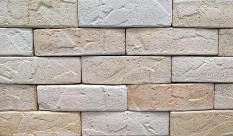 Beige tone stone brick background . beige brick wall background texture clo.. Stock Photos