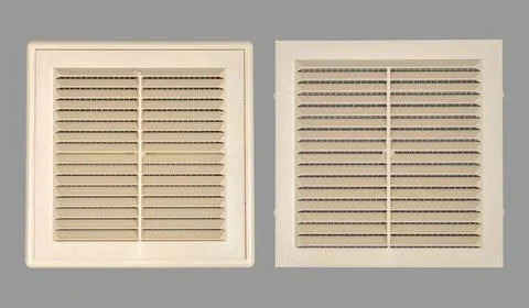 Beige ventilation grate on a gray background. Square shape, plastic material. Stock Photos