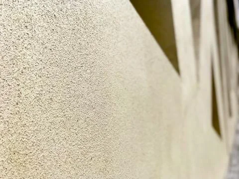 Beige wall abstract background closeup Stock-Fotos