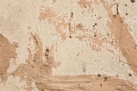 Beige wall with a crack as a background Stock Photos