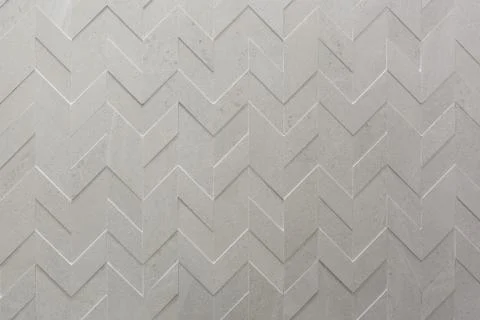 Beige wall tiles. Rectangular patterns. Stock Photos