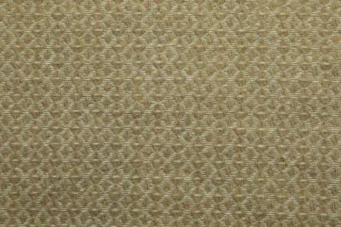 Beige woolen fabric with geometrical pattern as background, top view Stock Photos