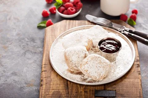 Beignets with raspberry jam Stock Photos