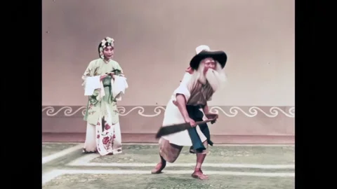 BEIJING - 1957 - A Peking Opera concludes with an old ferry man transporting a Stock Footage 323261102