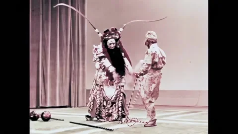 BEIJING - 1957 - In this Peking Opera, the Monkey King escapes from the Jade Stock Footage 323259600