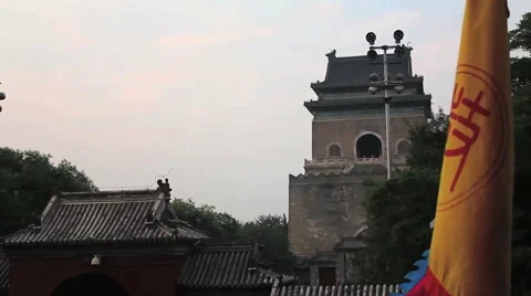 Beijing Bell Tower rooftops &amp; flag, China Stock Footage 53238032