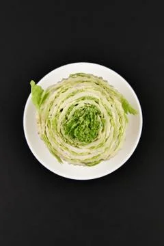 Beijing cabbage on a black background. Permanent manager of fresh, dietary gr Foto stock