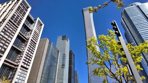 Beijing CBD Morning Rush Hour Traffic and Skyscrapers, China - April 2026 Stock Footage 336601771