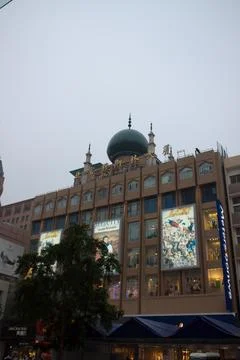 Beijing, China, 14.07.2010. A large building with a green dome and a blue sig Stock Photos