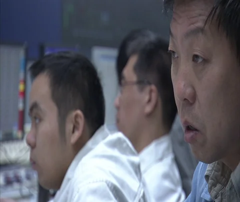 Beijing, China; CU control room workers in Shen Hua Sanhe coal power plant Stock Footage 86746129
