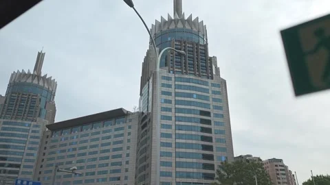 BEIJING, China - May 10, 2026: BEIJING, China May 10, 2026,. Modern skyscraper Video stock 335883318
